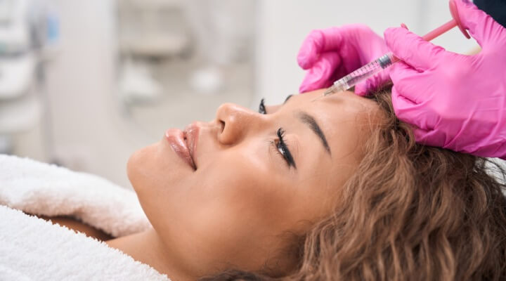 woman getting facial rejuvenation injection